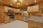 Fully Equipped Kitchen with Granite Countertops